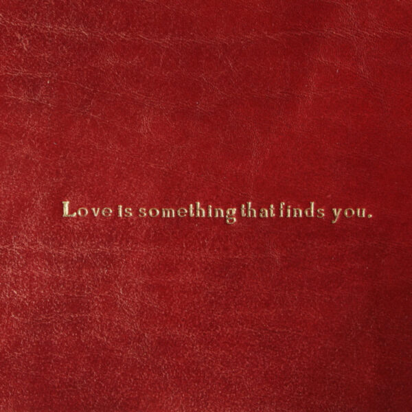 Vuota tasche in pelle. Rosso con frase d'amore - immagine 2